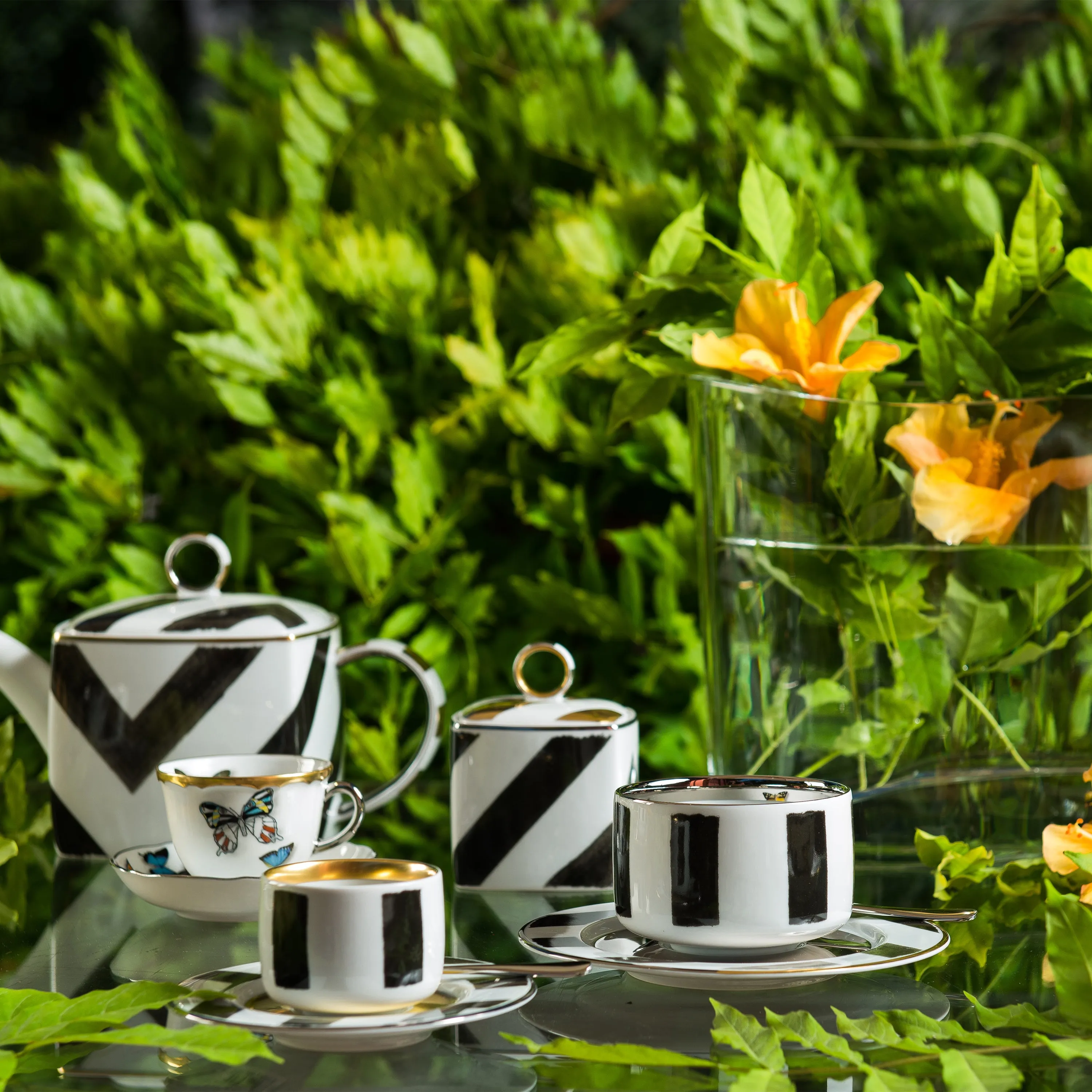 Sol Y Sombra Coffee Cup with Butterfly & Saucer