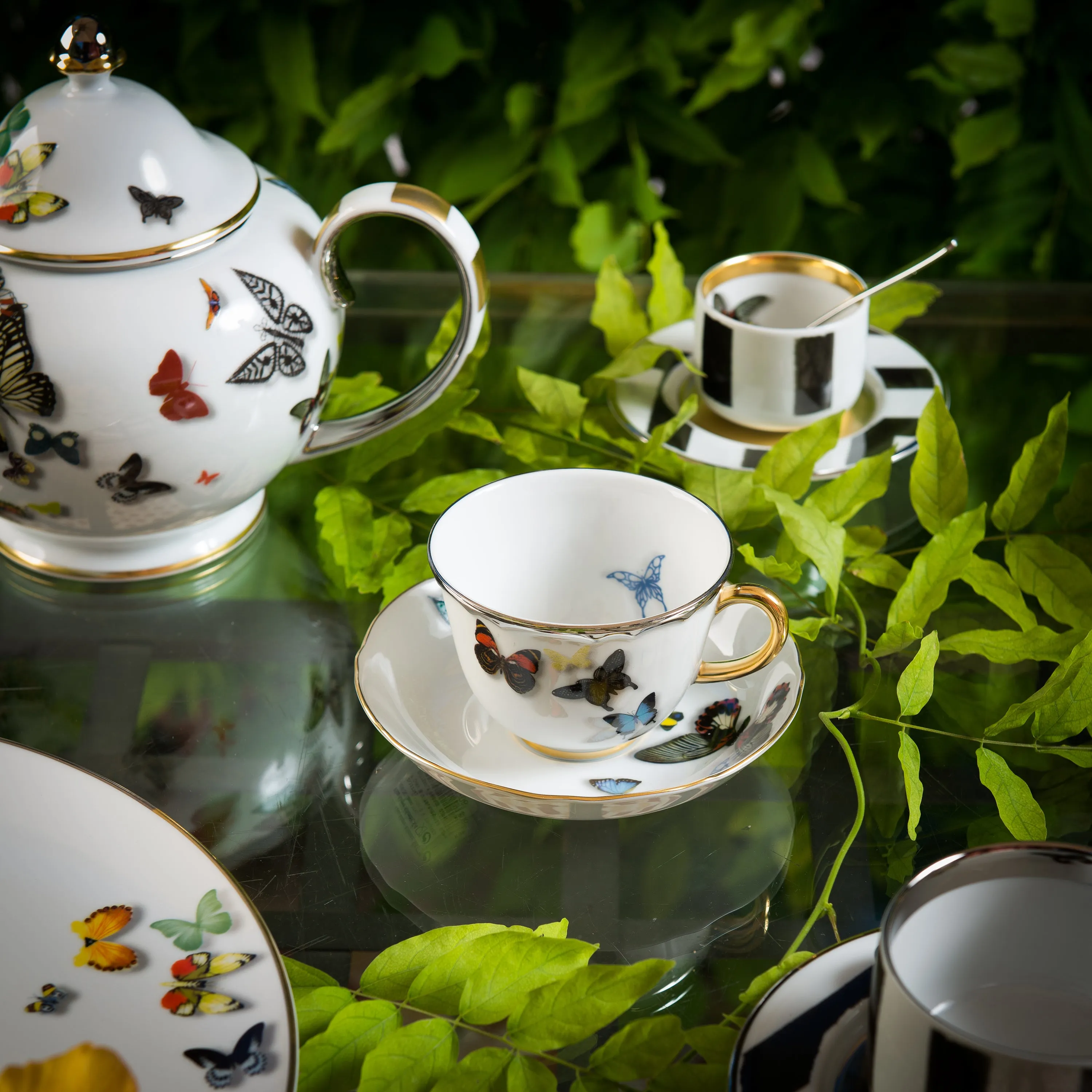 Sol Y Sombra Coffee Cup with Butterfly & Saucer